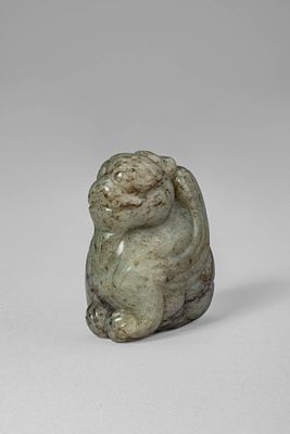 CHINESE GREY JADE ANIMAL PENDANT. Ming Dynasty, Ca. 14th-17th century AD. A finely carved jade 