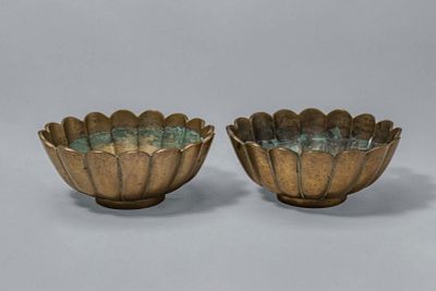 PAIR OF CHINESE BRONZE CHRYSANTHEMUM BOWLS. Qing Dynasty, Ca. 18th-20th century AD. A pair of 