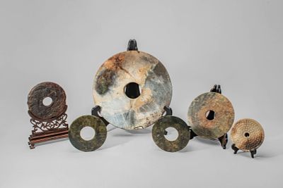 GROUP OF SIX CHINESE HARDSTONE BI DISCS. Qing Dynasty, Ca. 18th-20th century AD. A fine and 