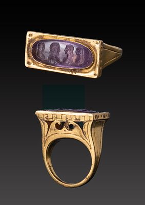 RARE ROMAN HIGH KARAT GOLD ARCHITECTURAL OPENWORK RING WITH AMETHYST INTAGLIO OF IMPERIAL BUSTS. 