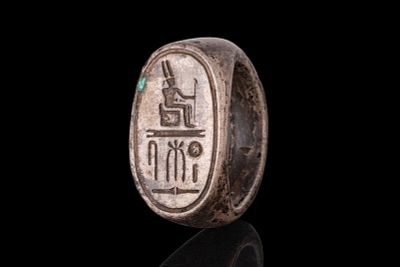 EGYPTIAN SILVER STIRRUP SEAL RING WITH NAME OF RAMESSES II. New Kingdom, Ca. 1295 - 1213 BCA 