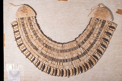 EGYPTIAN BICHROME GLAZED COMPOSITION BEADED BROAD COLLAR NECKLACE. New Kingdom, Ca. 1550 - 1069 