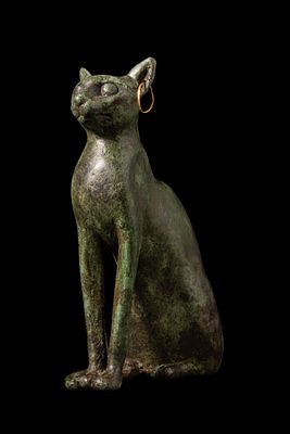 RARE EGYPTIAN BRONZE CAT FIGURE WITH GOLD EARRINGS. Late Period, Ca. 664 - 332 BC A fine bronze 