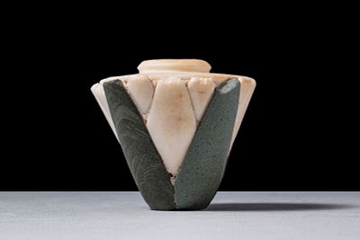 EGYPTIAN MULTI STONE LOTUS CUP. Late Predynastic Period to Early Dynastic Period, Ca. 3325 - 