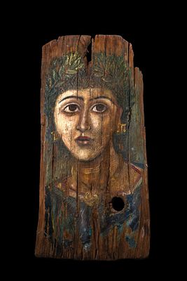 ROMANO-EGYPTIAN WOODEN FUNERARY PORTRAIT OF NOBLEWOMAN. Ca. AD 100 - 300 A wooden funerary 