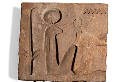 EGYPTIAN SANDSTONE RELIEF WITH HIEROGLYPHIC INSCRIPTION WITH CARTOUCHE. New Kingdom, Ca. 1550 - 