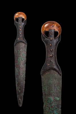 EGYPTIAN BRONZE DAGGER WITH HIPPOPOTAMUS TOOTH POMMEL. Middle Kingdom, Ca. 2055 - 1790 BC A 