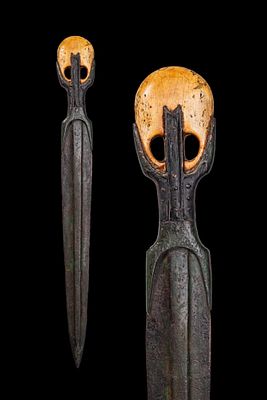 EGYPTIAN BRONZE DAGGER WITH HIPPOPOTAMUS TOOTH POMMEL. Middle Kingdom, Ca. 2055 - 1790 BC A 