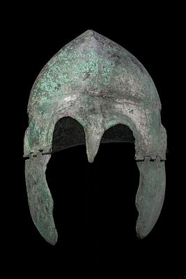 CHALCIDIAN HIGH TINNED BRONZE HELMET WITH CHEEKS. Ca. 300 BCA tinned bronze Chalcidian helmet 