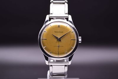 Jaeger-LeCoultre A Gentleman's Stainless Steel Manual Winding Dress Watch with Tropical Dial C.1956