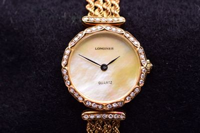 Longines Ladies18k Yellow Gold Factory Diamond Set Mother Of Pearl Dial Dress Watch. C.1990ABAn 