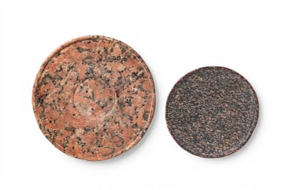 PAIR OF EGYPTIAN GRANITE OFFERING PLATES. Old Kingdom, Ca. 2600 - 2200 BC. A pair of granite 