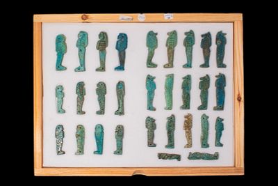 LARGE COLLECTION OF EGYPTIAN FAIENCE AMULETS OF SONS OF HORUS. Ca. 664 - 332 BC. A collection of 