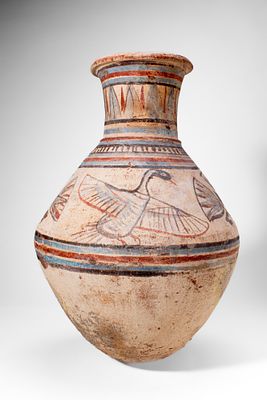 EGYPTIAN TERRACOTTA JAR WITH BIRDS. Amarna Period, Ca. 1353 - 1336 BC. A pottery jar with a 