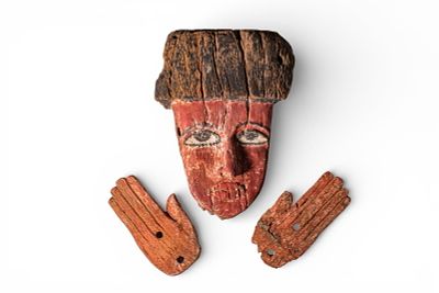 INTERESTING COLLECTION OF EGYPTIAN FUNERARY ELEMENTS FROM A POLYCHROME COFFIN. Late Period to 