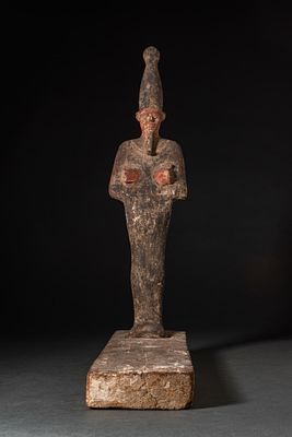 EGYPTIAN PAINTED WOOD FIGURE OF OSIRIS. Third Intermediate Period, Ca. 1069 - 664 BC A painted 