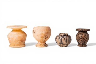 COLLECTION OF EGYPTIAN STONE OFFERING VESSELS. New Kingdom, Ca. 1550 - 1069 BC. A collection of 