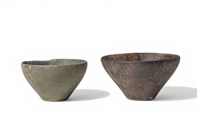 PAIR OF EGYPTIAN HARDSTONE OFFERING BOWLS. Old Kingdom, Ca. 2600 - 2200 BC. A pair of hardstone 