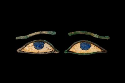 PAIR OF EGYPTIAN EYE INLAYS AND EYEBROWS. Late Period, Ca. 664 - 30 BC. A matching set of mummy 