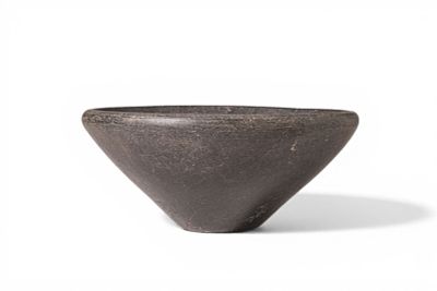 EGYPTIAN GREY STONE OFFERING BOWL. Old Kingdom, Ca. 2600 - 2200 BC. A grey stone offering bowl 