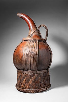 CAMEROON PALM WINE GOURD VESSEL. Ca. 20th century AD. >A vessel formed from a natural gourd with 