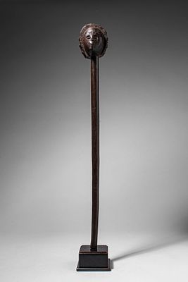 CHOKWE WOODEN STAFF. Angola, Ca. late 19th - early 20th century AD. >A slender staff surmounted 