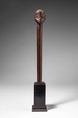 CHOKWE WOODEN STAFF. Angola, Ca. late 19th - early 20th century AD. >A slender cylindrical staff 