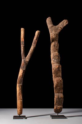 TWO MALI DOGON LADDERS. Ca. 19th century AD. A group of two Dogon ladders carved from tree 