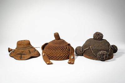 GROUP OF THREE KUBA HATS. Democratic Republic of Congo, Ca. 20th century AD. >A group of three 