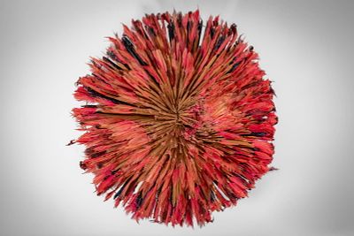 CAMEROON FEATHERS STRAW CLOTH HAT. Ca. 20th century AD. >A circular ceremonial hat composed of 