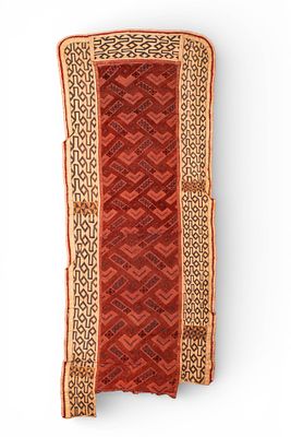 KUBA RAFFIA SKIRT END. Ca. 20th century AD. >A Kuba raffia skirt panel woven from natural raffia 