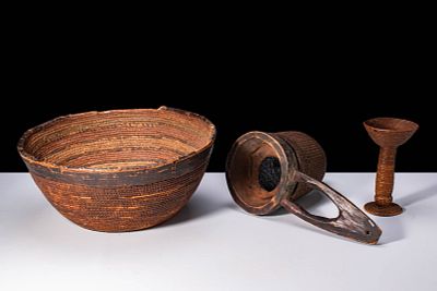 GROUP OF AFRICAN BASKETS. Ca. 19th - 20th century AD. A group comprising a large deep bowl, a 