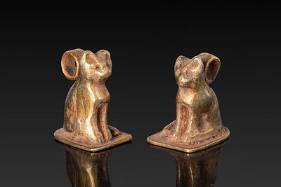 PAIR OF EGYPTIAN GOLD CAT AMULETS. Late Period, Ca. 664 - 332 BC. A pair of gold cat amulets 