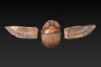 EGYPTIAN GOLD WINGED SCARAB. Late Period–Ptolemaic Period (ca. 664–30 B.C.) A gold applique of a 