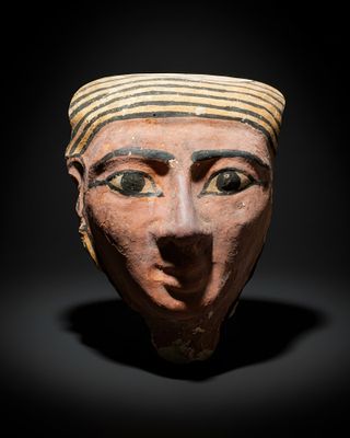 HUGE EGYPTIAN COFFIN MASK. Late Period, Ca. 664 - 332 BC. A coffin mask with a layer of plaster 