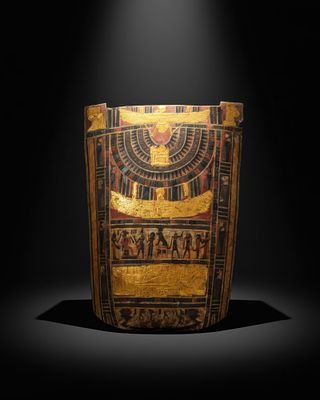 EGYPTIAN SARCOPHAGUS PANEL PARTIALLY GILDED, WITH EMBALMING SCENE AND DEITIES. Ptolemaic Period 