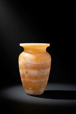 STUNNING EGYPTIAN ALABASTER VESSEL. Old Kingdom, Ca. 2600 - 2200 BC. An alabaster vessel with an 