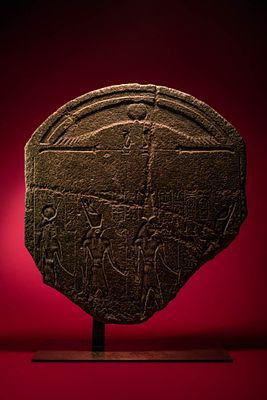 RARE EGYPTIAN GRANODIORITE TEMPLE STELE FRAGMENT WITH NECTANEBO II MAKING AN OFFERING TO OSIRIS, HOR