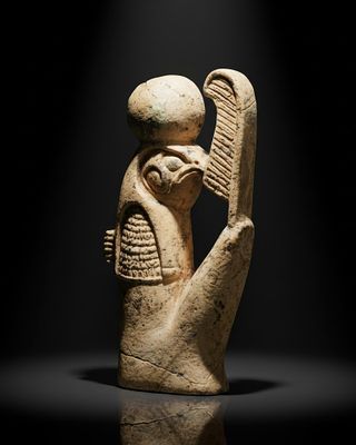 EGYPTIAN STONE AMULET OF RA-HORAKHTY. Late Period, Ca. 664 - 332 BC. A stone amulet of 