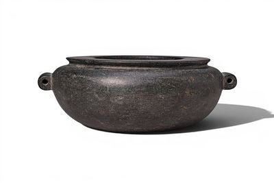 EGYPTIAN OLD KINGDOM OFFERING BLACK STONE BOWL. Old Kingdom, Ca. 2600 - 2200 BC. A black stone 