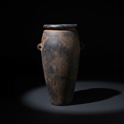 SUPERB EGYPTIAN STONE PIRIFORM JAR. New Kingdom, Ca. 1550 - 1069 BC. A stone piriform jar with a 