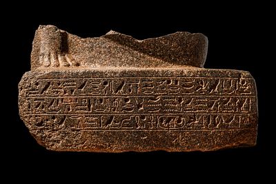 MONUMENTAL EGYPTIAN BASE OF A SCULPTURE BELONGING TO THE MASTER HORIRAA. Second half of Dynasty 