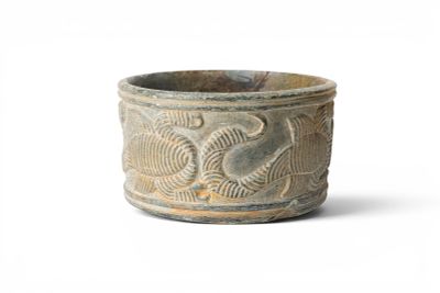 BACTRIAN CHLORITE PYXIS WITH SCORPIONS. Ca. 2000 BC. A chlorite pyxis with a cylindrical body 