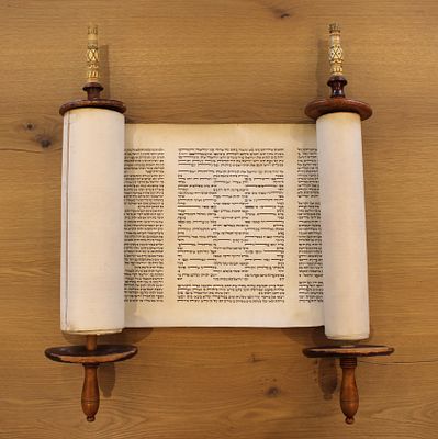 A Complete Torah Scroll with Atzei Chaim and Mantle. A complete Torah scroll containing all the 