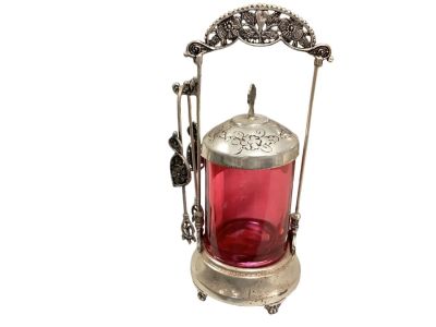 Silver Plated Pickle Jar with Tongs. 11&icirc; H. worn. Condition: We have endeavored to describe all 