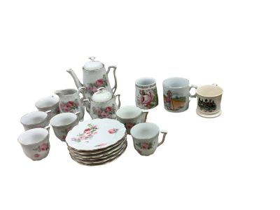 Children's Tea Set. (15) piece child&iacute;s tea set. (3) extra cups, (2) marked Germany.Shipping 