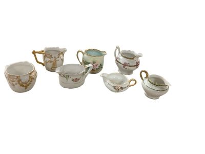 Grouping of China Creamers. (6) creamers and (1) open sugar. From Austria, France and Germany. 