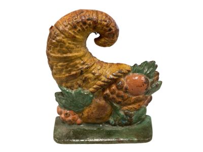 Antique Cast Iron Cornucopia w/ Fruit Doorstop 7&icirc; T. 6&icirc; W. Condition: We have endeavored to 