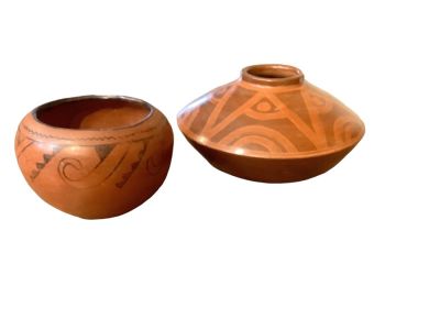American Indian Pottery. American Indian Pottery Lot of (2) includes a 4"H pot and a pot that 
