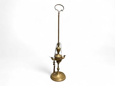 Early Brass Whale Oil Lamp. Early Brass Whale Oil Lamp 24" T Condition: Used. 
We have 